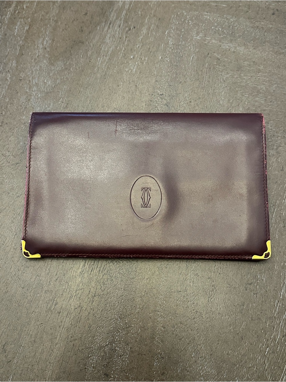 Cartier Burgundy Must de Cartier long bifold wallet